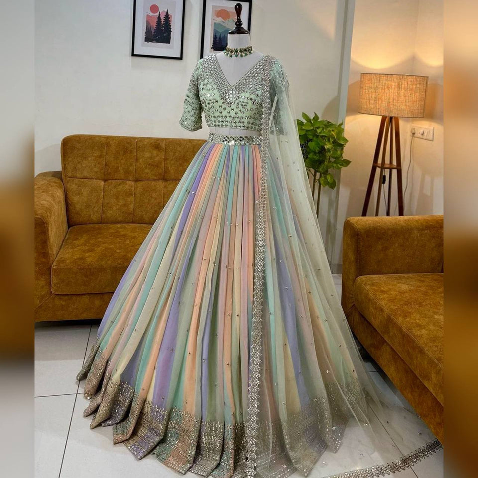 Multi Colour Digital Print Embroidered Attractive Party Wear Silk Lehenga choli has a Regular-fit and is Made From High-Grade Fabrics And Yarn.